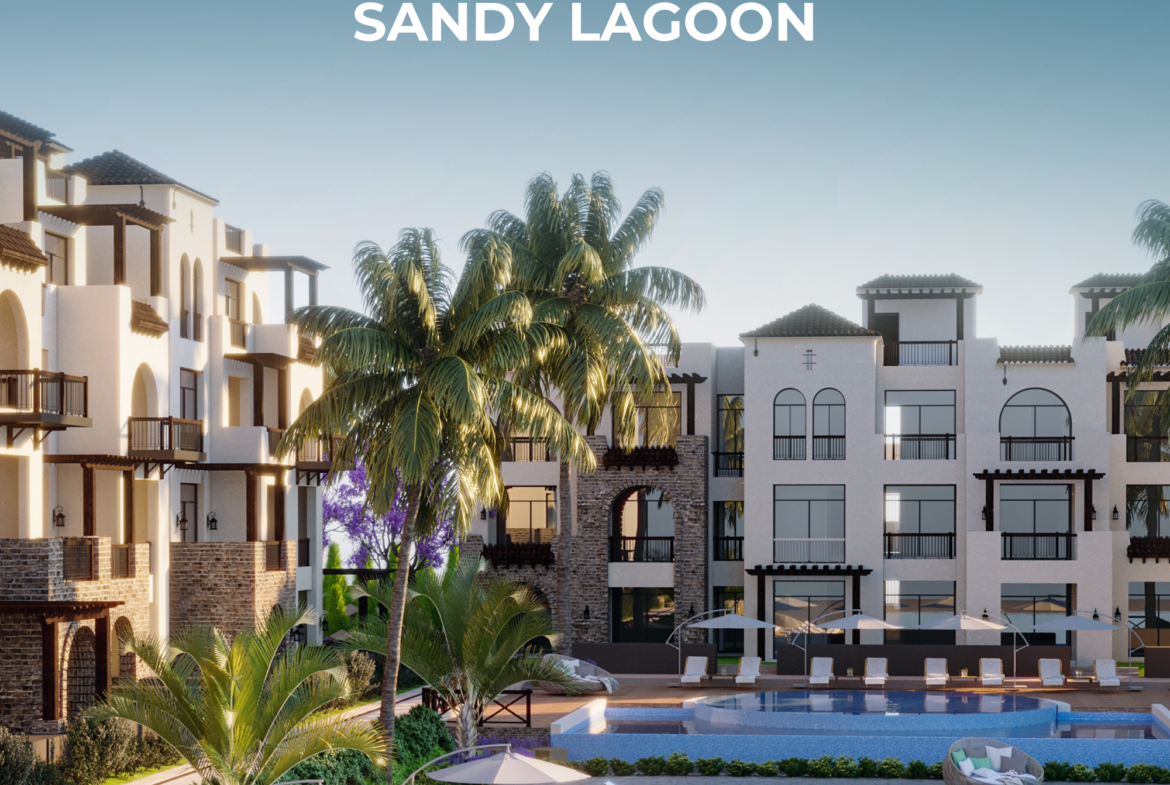 Sandy lagoon surrounded by low-rise residences in Sahl Hasheesh