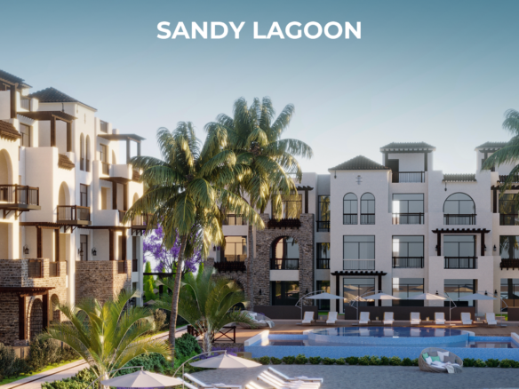 Sandy lagoon surrounded by low-rise residences in Sahl Hasheesh