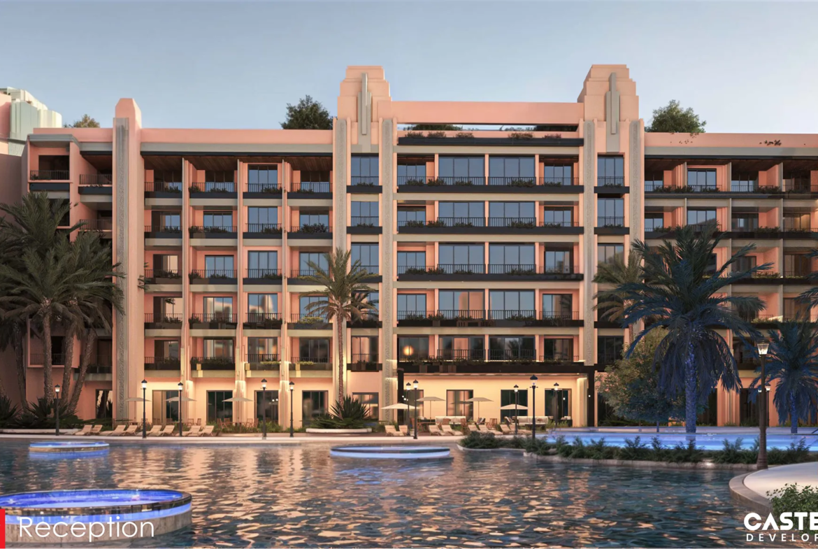 atlantis — developer visualisation — A multi-story modern building with balconies overlooking a pool surrounded by palm trees and illuminated lamps during dusk.