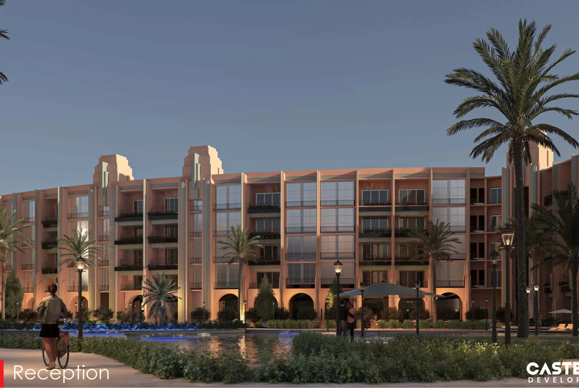 atlantis — developer visualisation — Evening view of a modern multi-story building with balconies, surrounded by palm trees and a reflecting pool, with people walking and a person with a bicycle nearby.