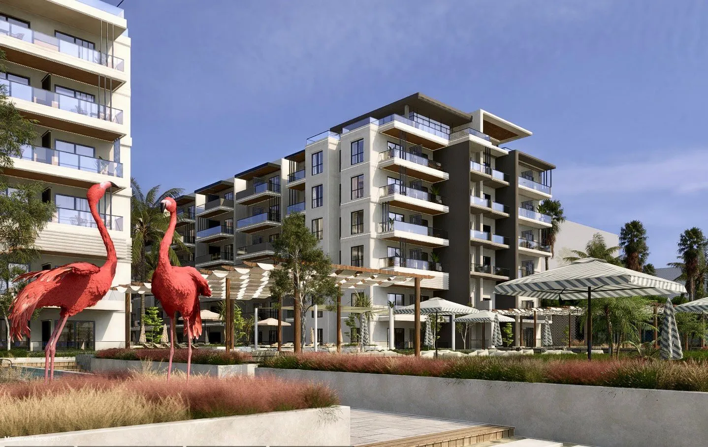 oro — developer visualisation — Modern apartment complex with balconies, outdoor seating areas under striped umbrellas, and two large red flamingo statues in the foreground.