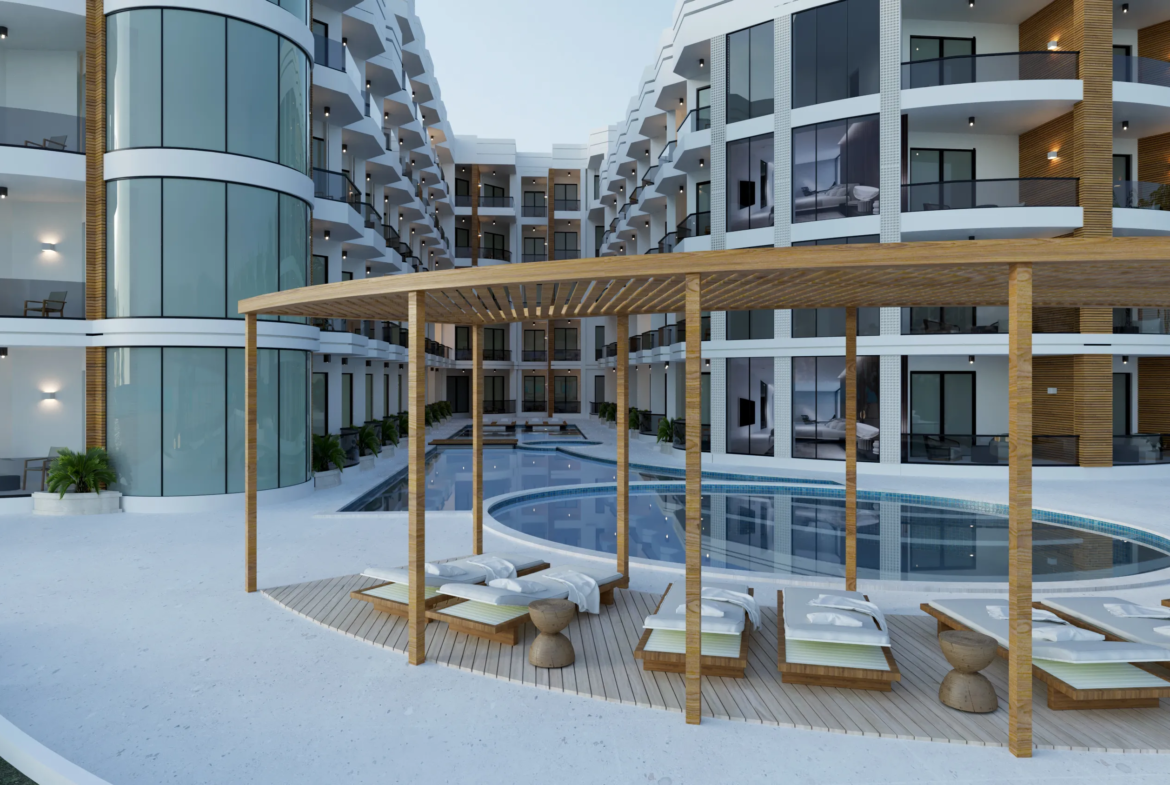 storia-del-mare — developer visualisation — Modern hotel courtyard with a kidney-shaped pool, wooden pergola, and cushioned lounge chairs surrounded by multi-story buildings with balconies.