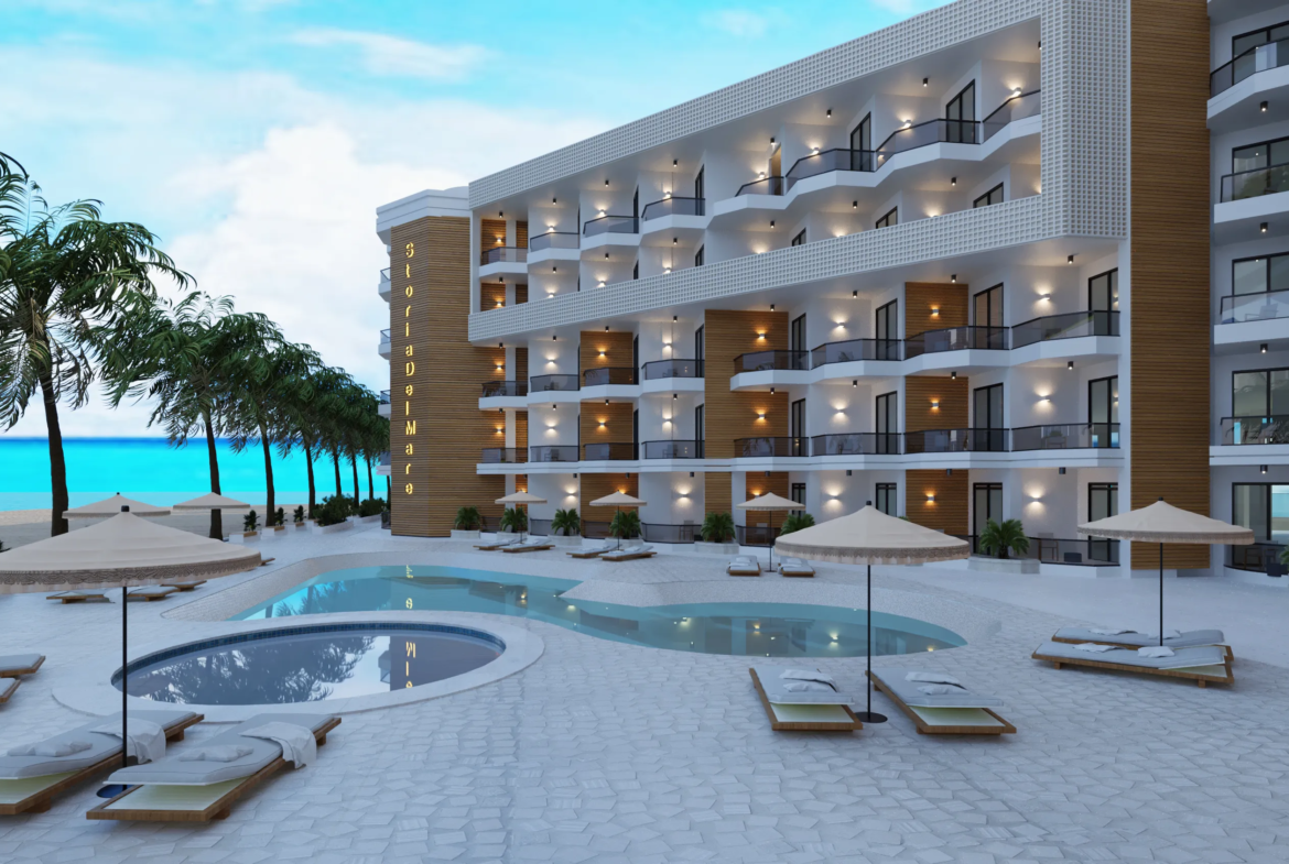 storia-del-mare — developer visualisation — Modern beachfront hotel with multiple balconies, pool, lounge chairs with umbrellas, and palm trees along the coast.